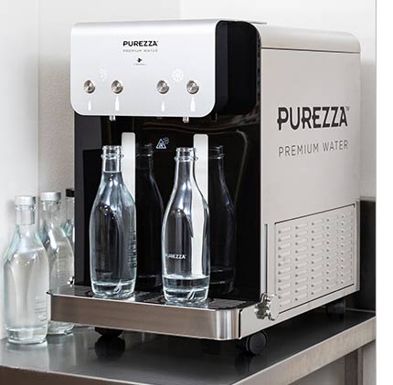 Purezza sparkling water tap being used in a restaurant